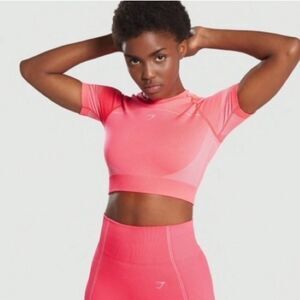 Gymshark Ultra Seamless Short Sleeve Compression Cutout Crop Top in Neon Pink M